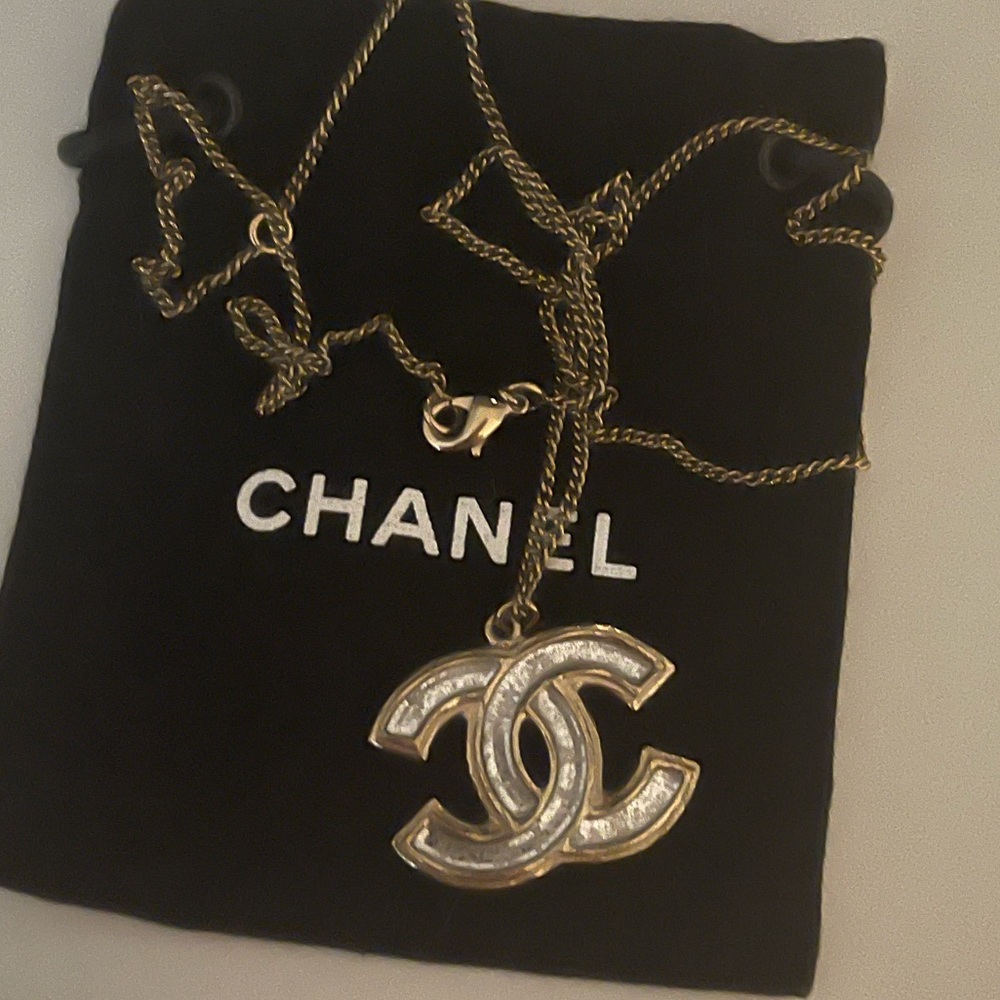 Chanel 2 tone played logo necklace.